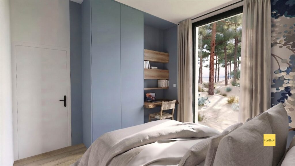 Visuel 3D d’une chambre aux placards bleus avec coin bureau et grande baie vitrée ouverte sur les pins